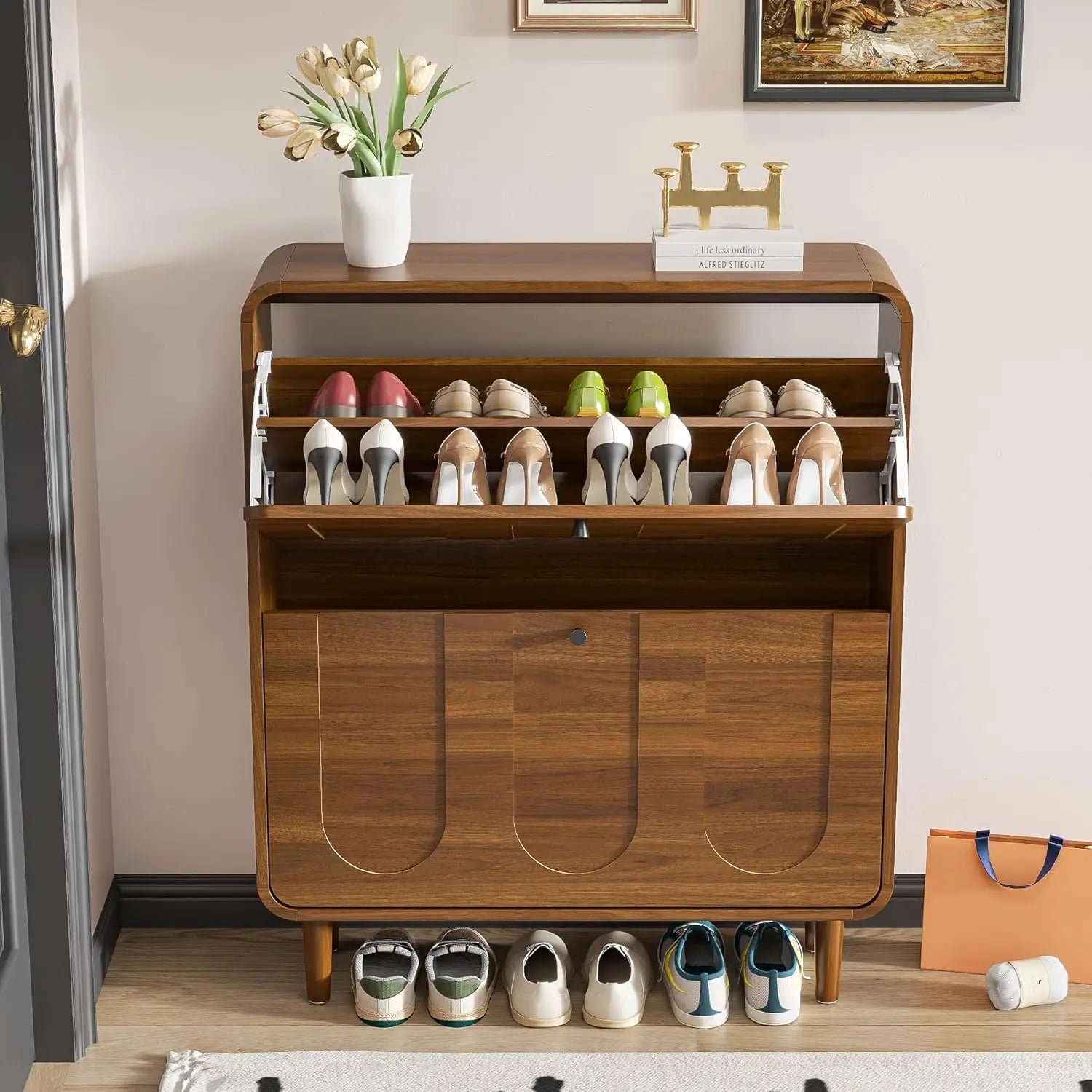 Narrow shoe cabinet closed in entryway — arched panel walnut wood design