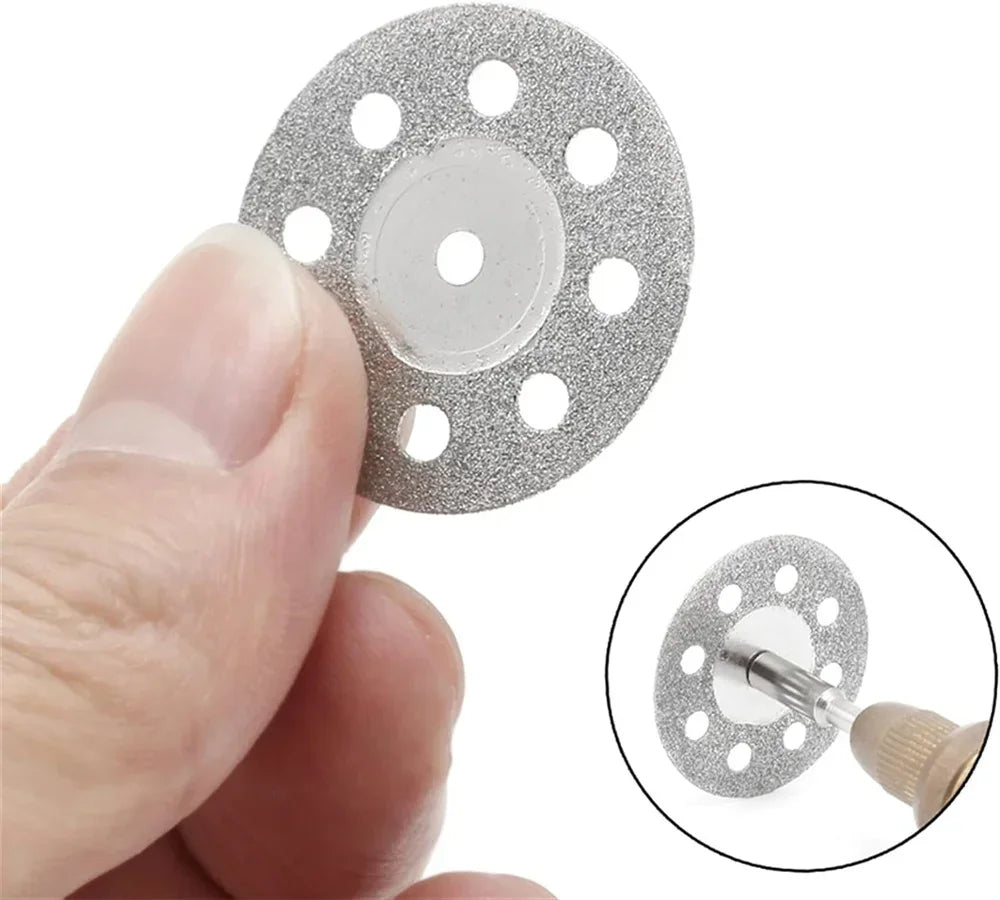 Hand holding 22mm diamond cutting disc showing size