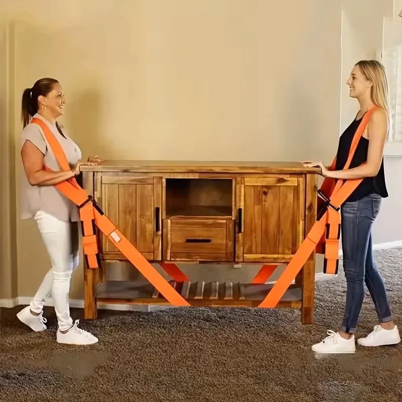Two people using moving straps to carry washing machine