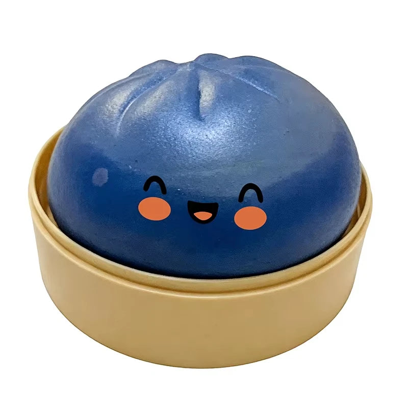 Blue glitter dumpling squishy fidget stress ball in steamer basket box