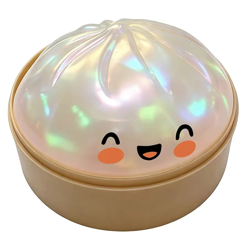Pearl white iridescent dumpling squishy fidget toy in steamer basket