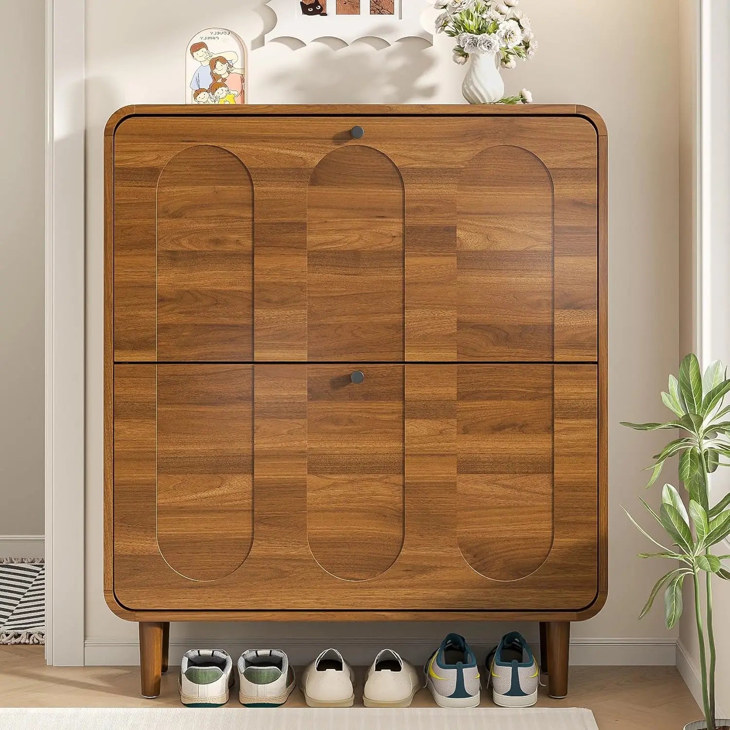 Narrow shoe cabinet walnut in entryway — arched panel design with shoes below