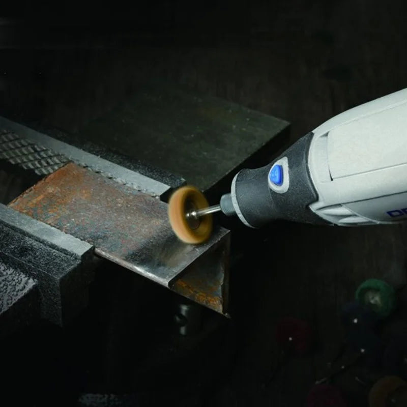 Nylon abrasive wheel removing rust from metal rotary tool